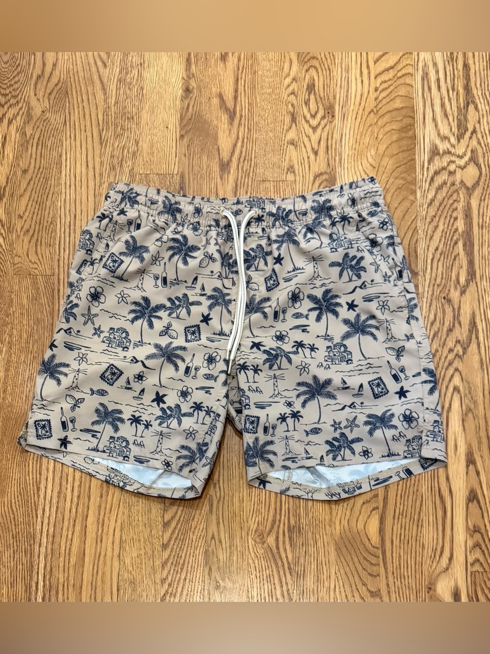 Lined George Beige Swim Trunks with Navy Tropical Print